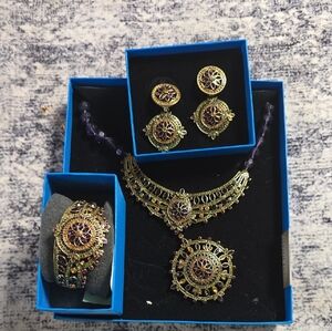 Elegant Heidi Daus Goldtone and Purple Jewelry Set